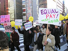 A parade marches down the Ginza after the gathering.